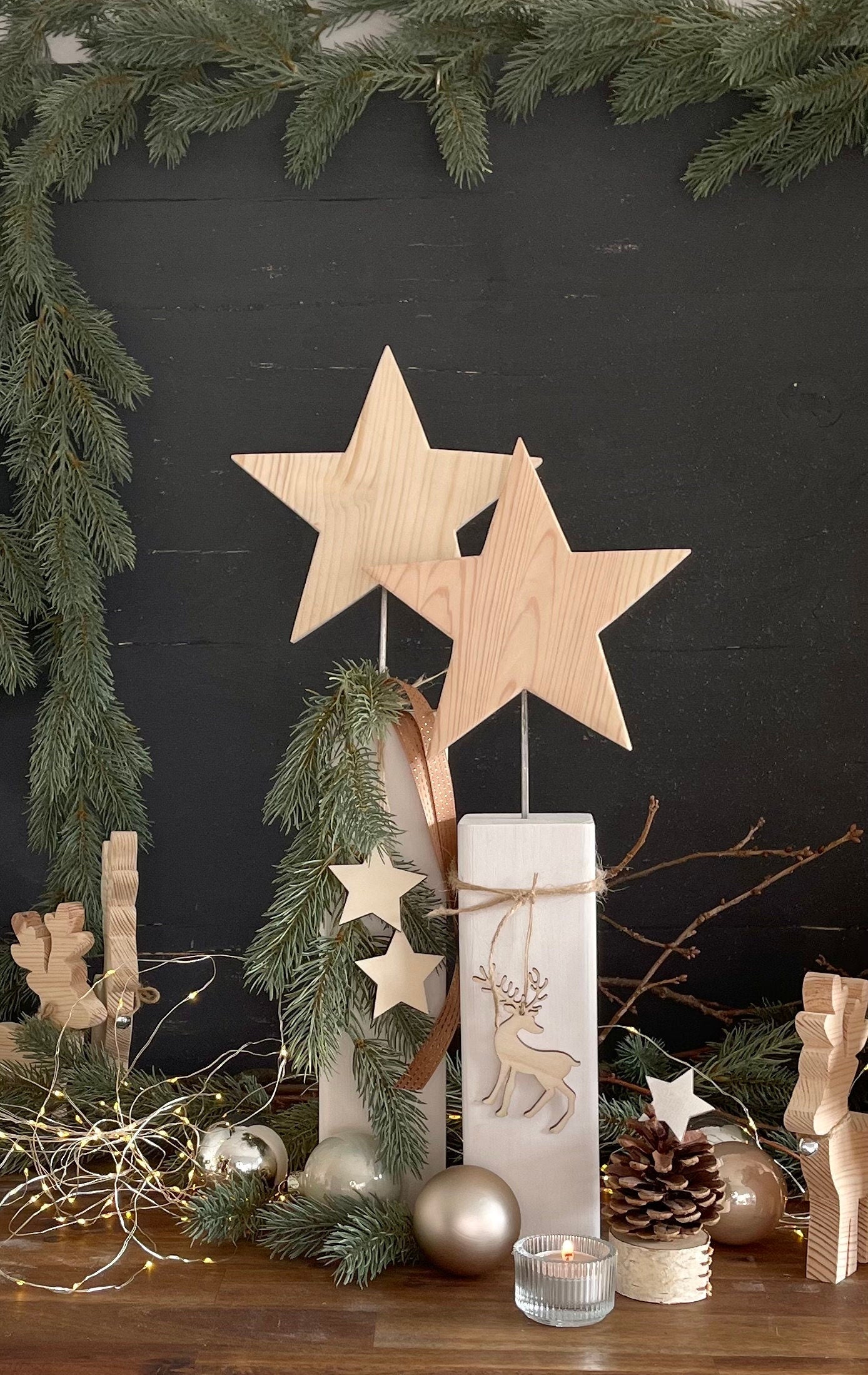 Stele mit Stern aus Holz